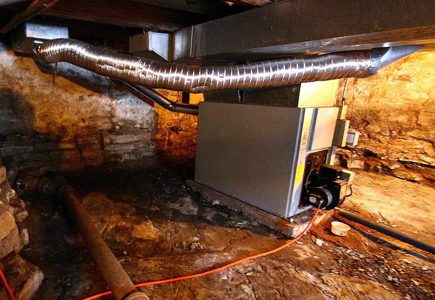 Home furnace and ductwork in a DeKalb County basement